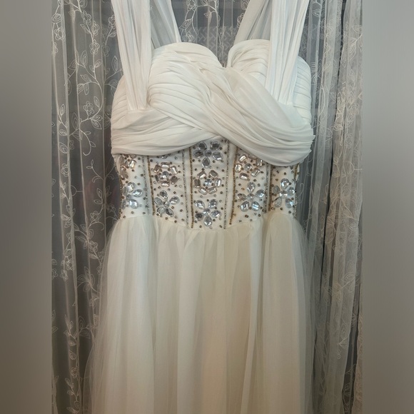 White tulle evening gown with silver and gold rhinestones. - Picture 2 of 4